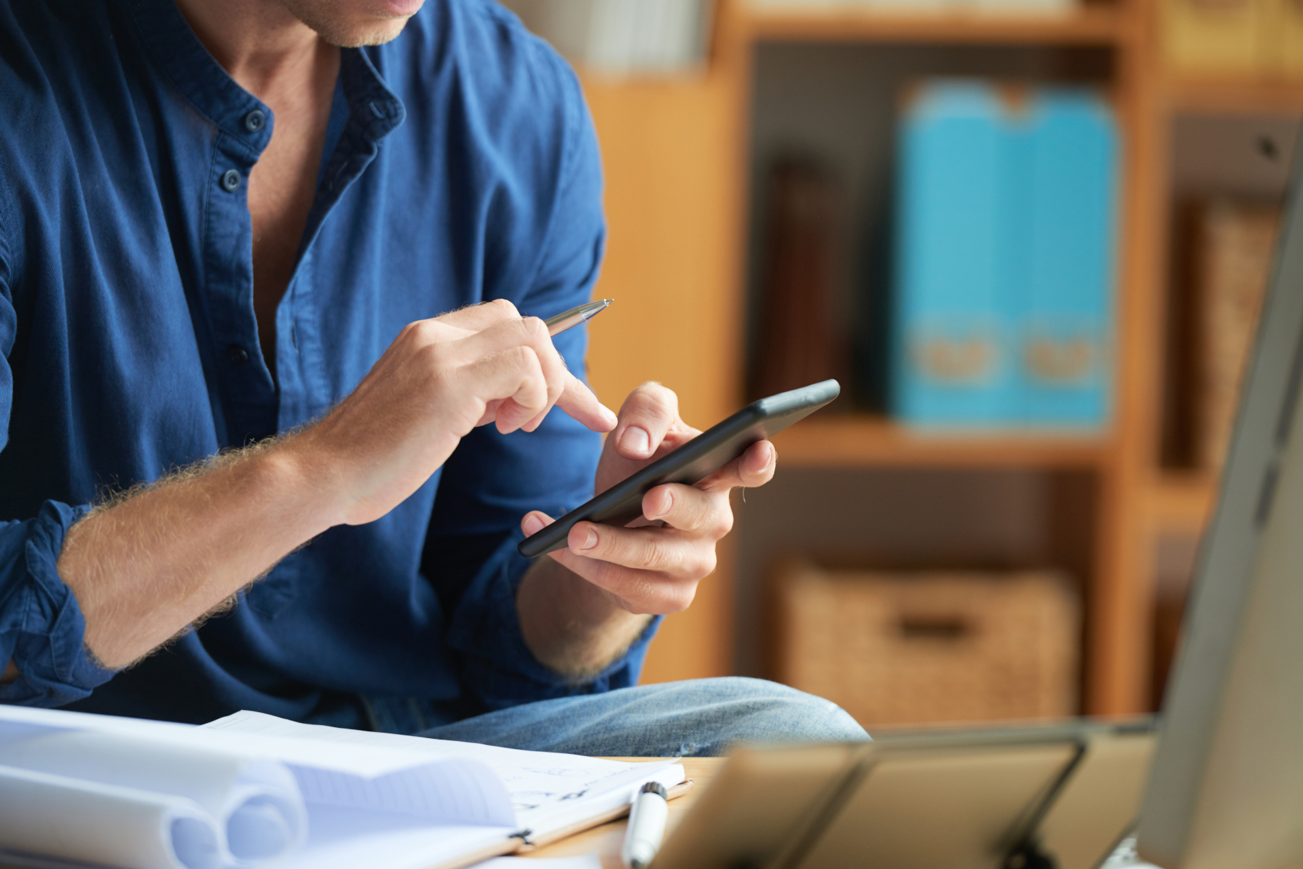 person texting while working